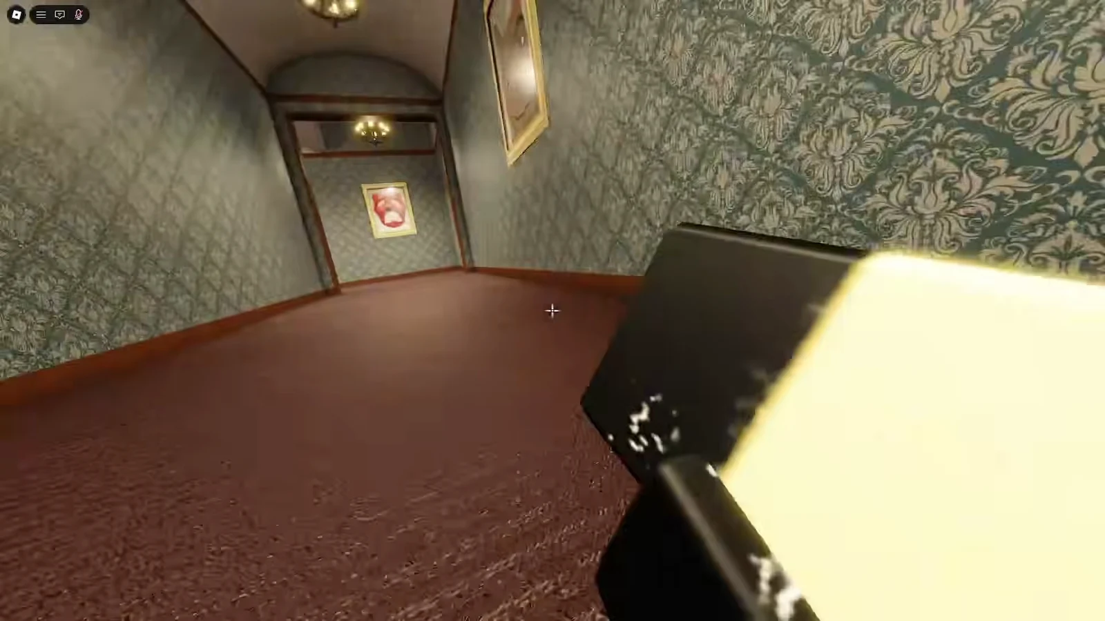 First-person view moving through a patterned hallway with a flashlight toward a framed picture