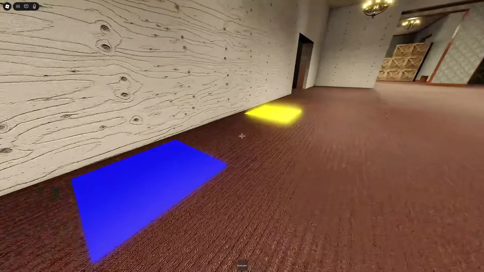 Glowing blue and yellow floor tiles ahead in the wood-paneled pad room