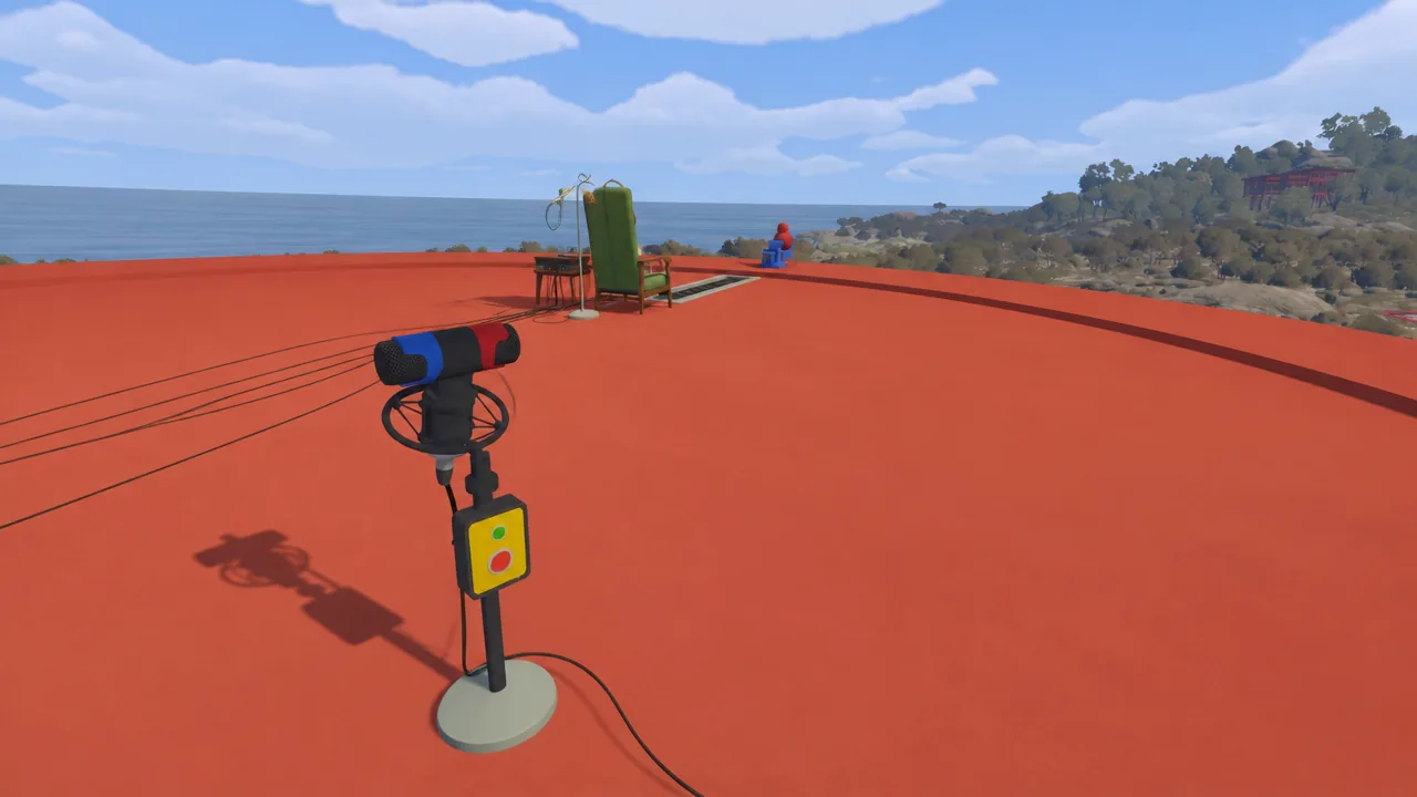 Freestanding microphone next to a red and green control panel ready to activate