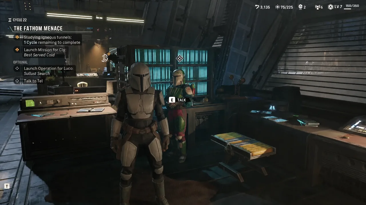 Tel-Rea at her console with the E TALK interaction prompt and the Talk to Tel objective active