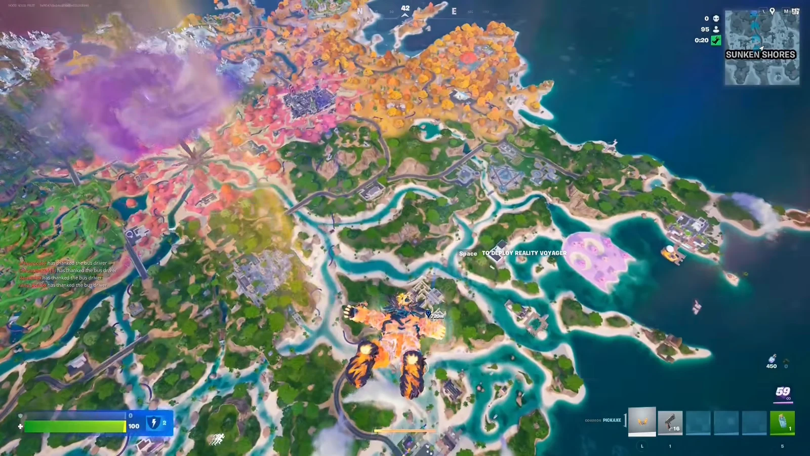 Player gliding over the island toward a marked location with a Reality Voyager deploy prompt on screen