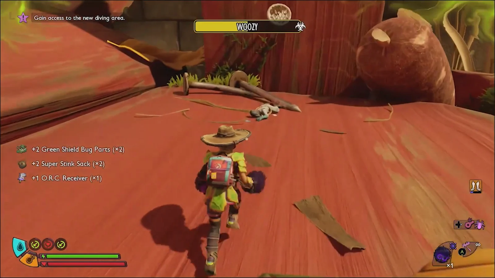 Player advancing after defeating the bug and collecting loot near the diving objective