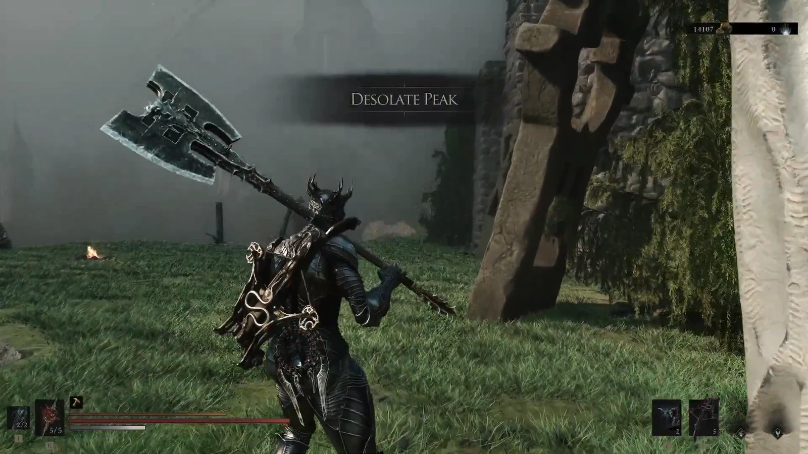 Player with a large axe at Desolate Peak beside a tall stone monument