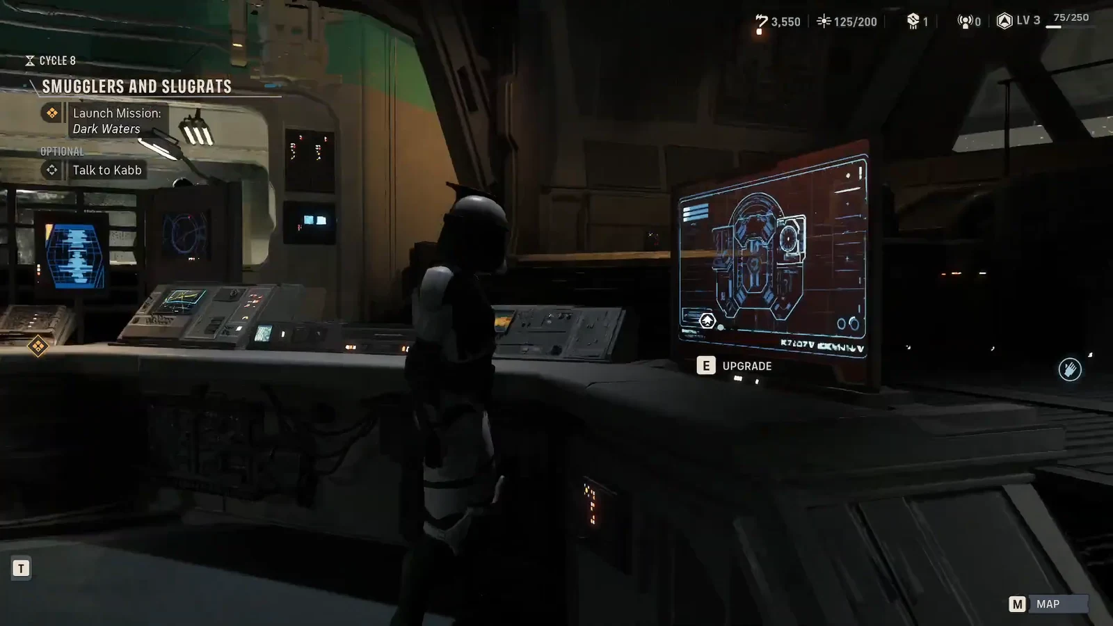 The upgrade station in the Den showing the on-screen UPGRADE interaction prompt