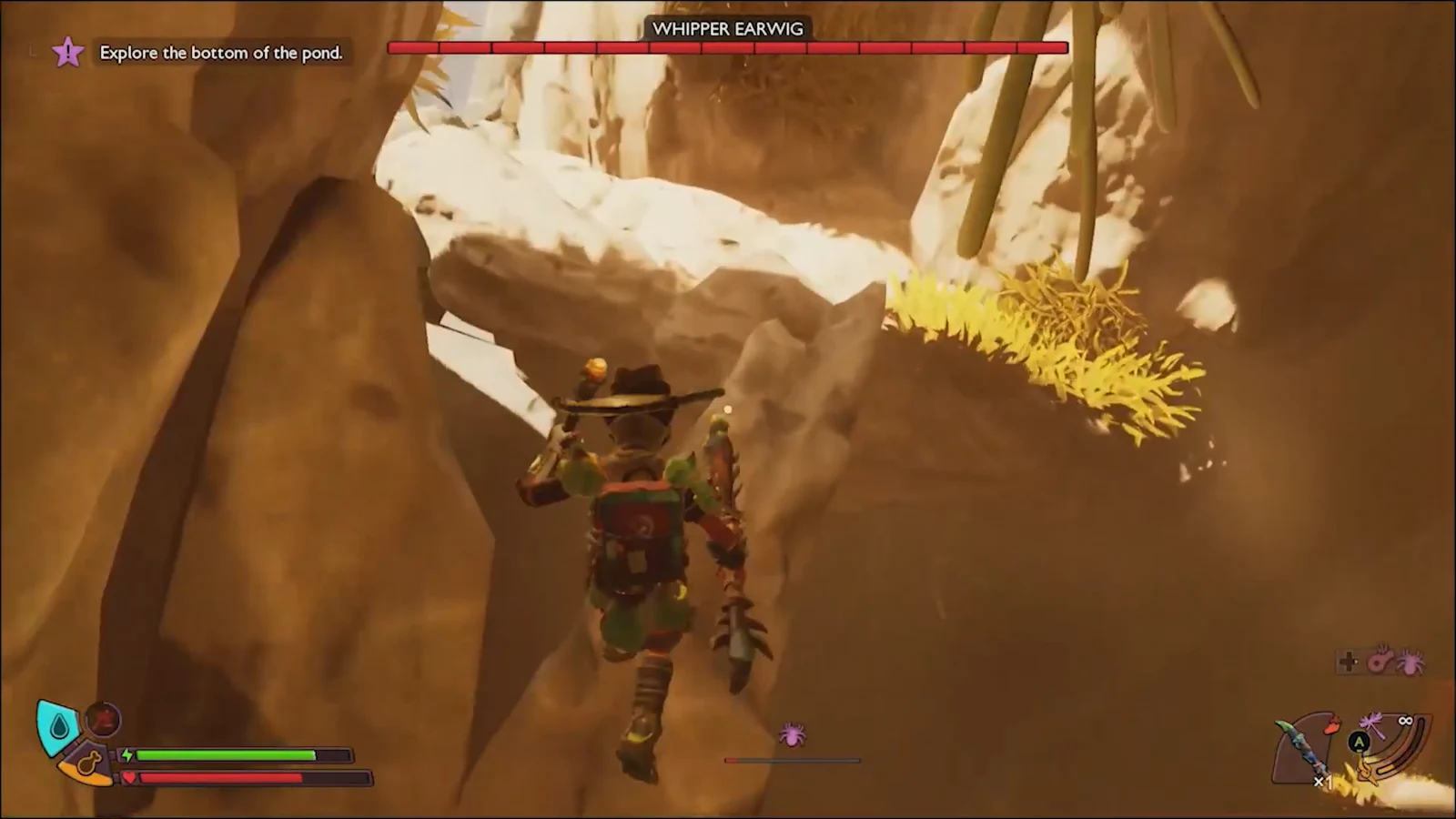 Player climbing rocks near the candles on the outer path of the tree