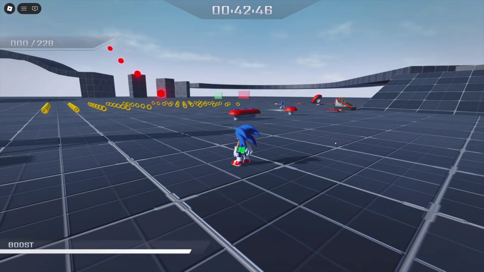 Sonic running a course lined with rings and red obstacles, with a timer and 000/228 ring counter