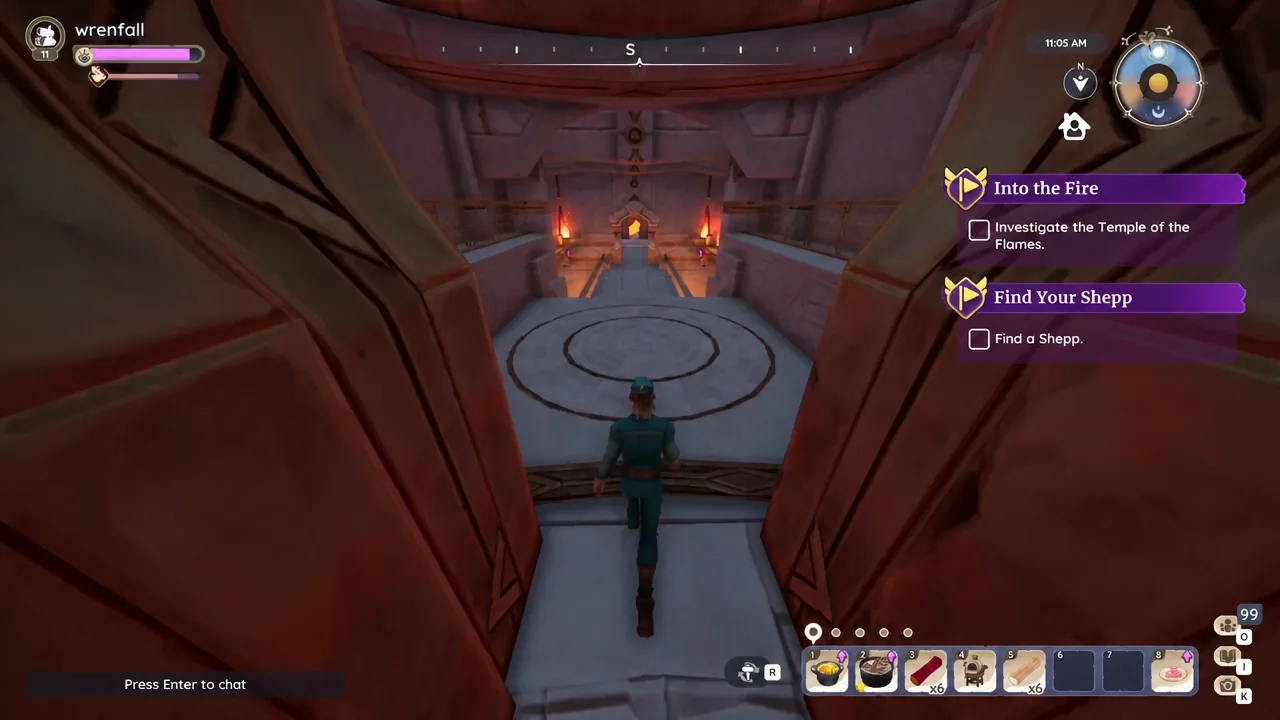 Player character entering the Temple of the Flames with the Into the Fire objective on screen