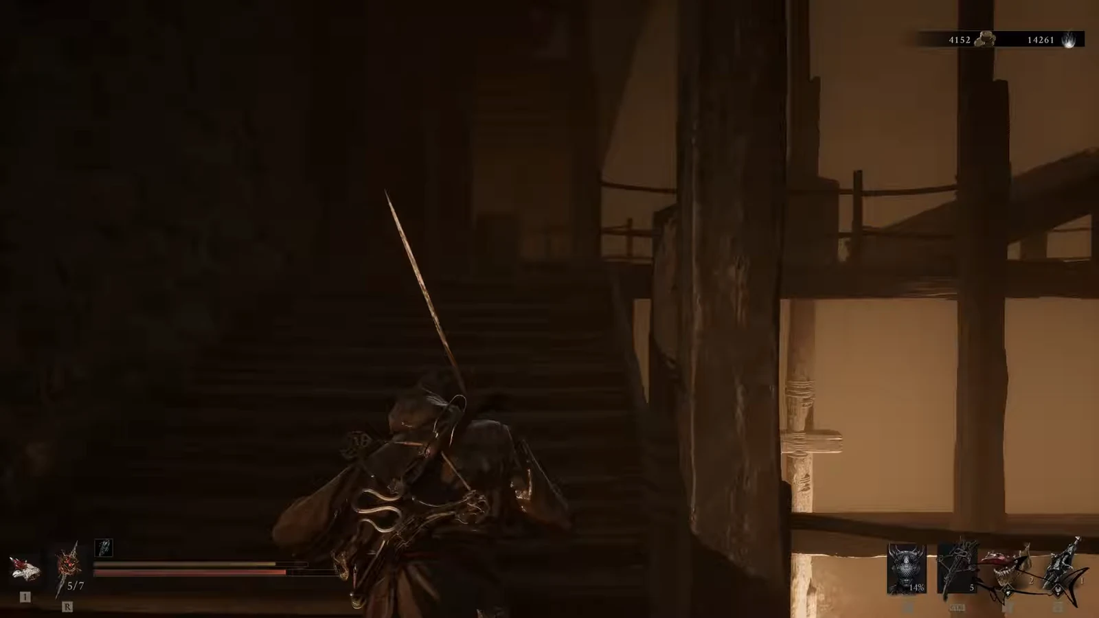Player climbing a dark wooden staircase with sword drawn on the way to the upper walkway