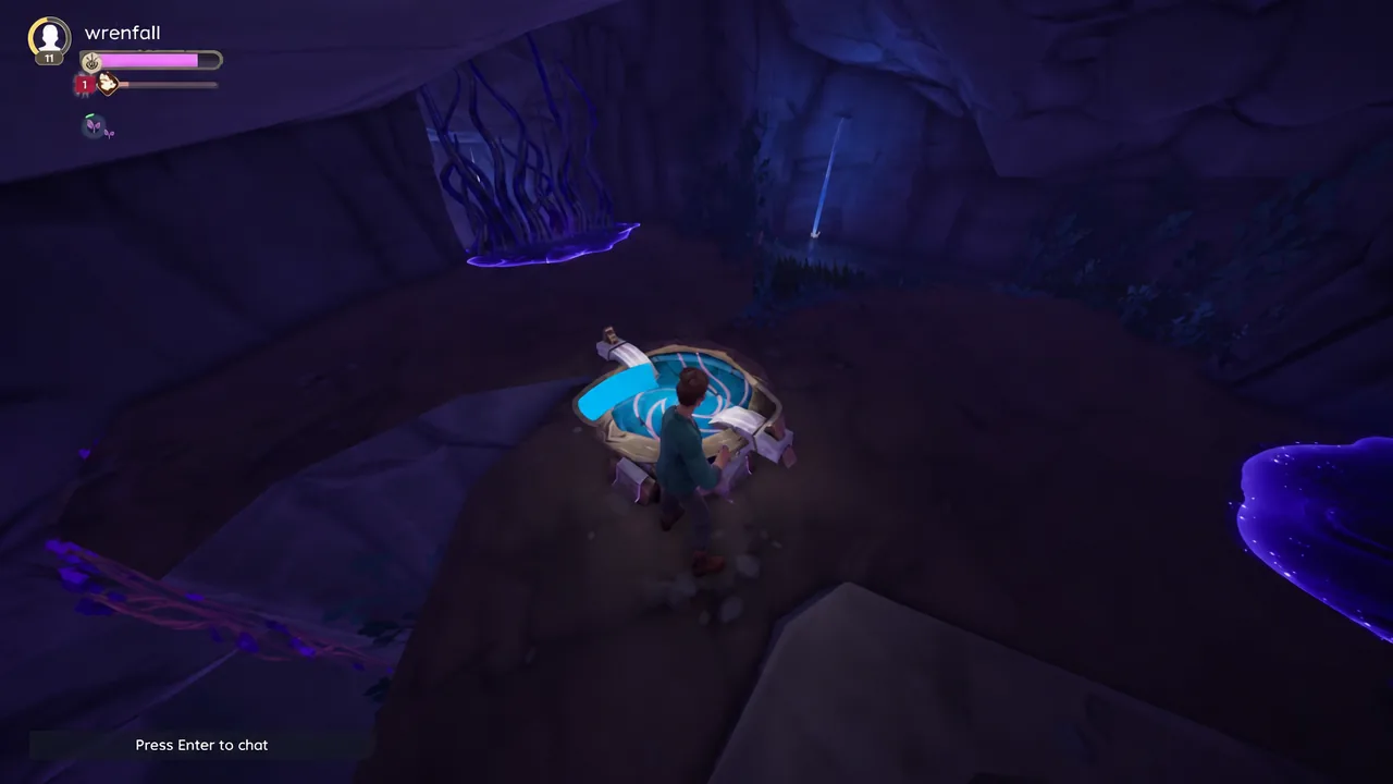 Interacting with a stone water basin in the Hidden Cave before cutting the vines