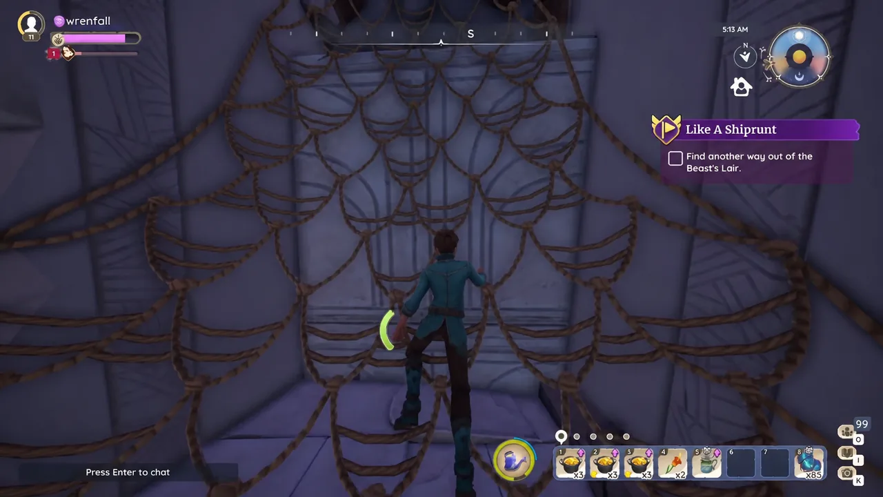 Climbing the rope net in the Beast's Lair with the objective to find another way out on screen