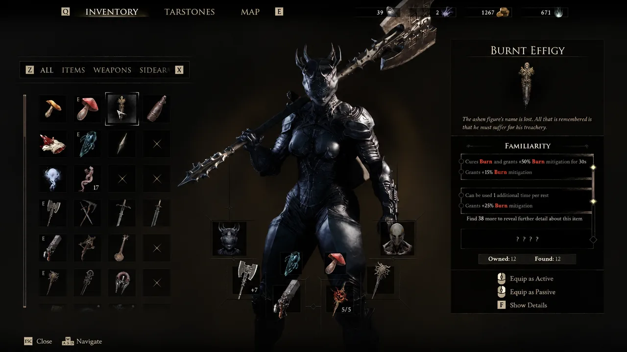 Inventory screen with Burnt Effigy selected, showing its effects and equip options