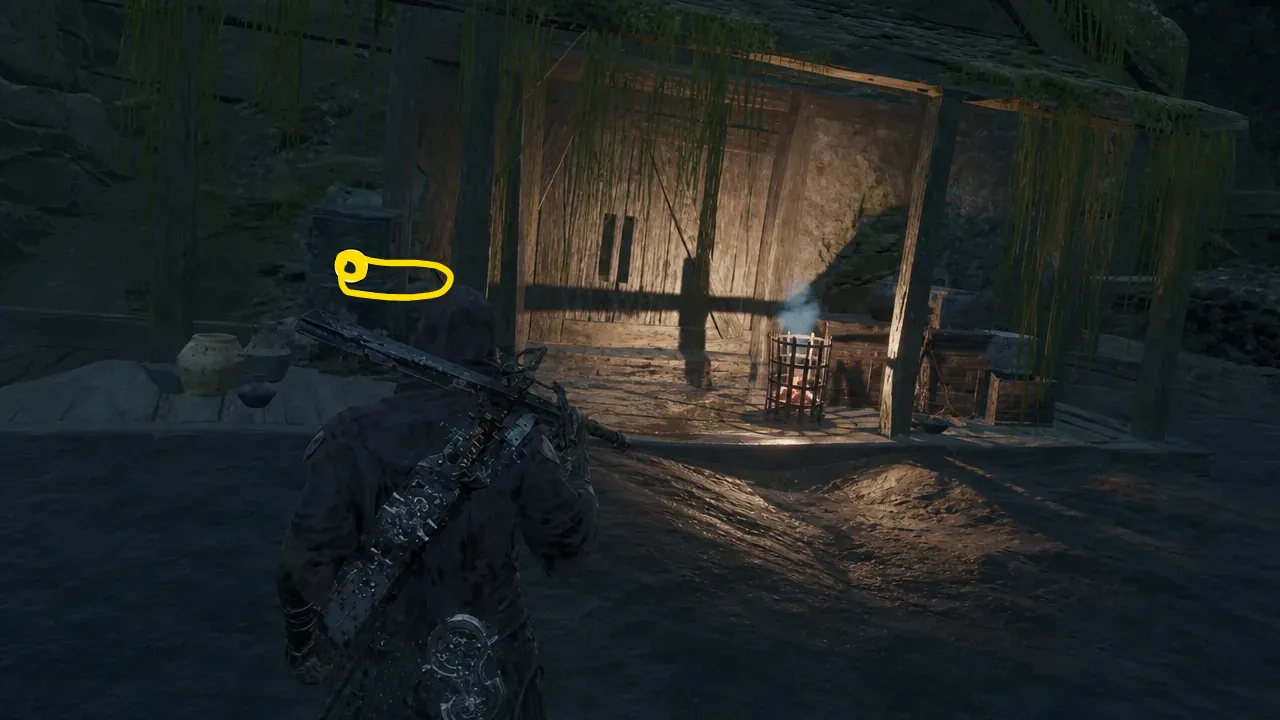 Player approaching a yellow-highlighted crate holding the Damp Key beside a wooden shelter