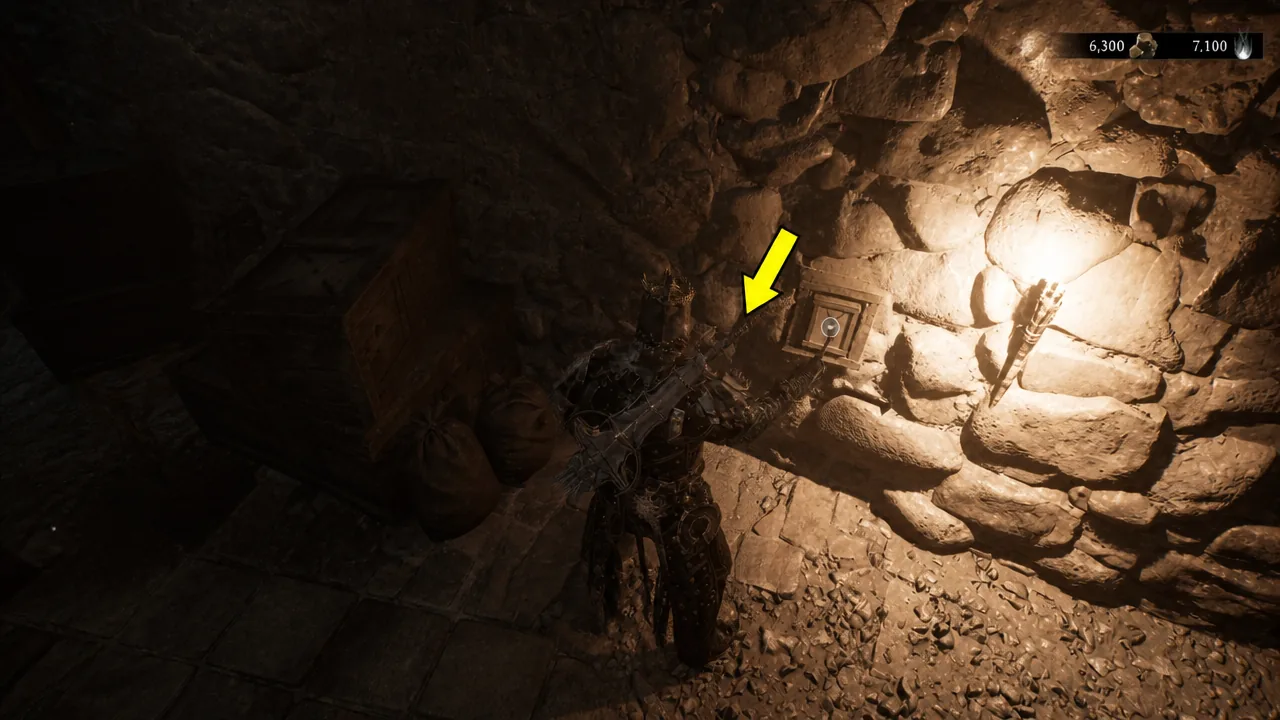 Yellow arrow marking a wall-mounted switch as the character moves in to press it.