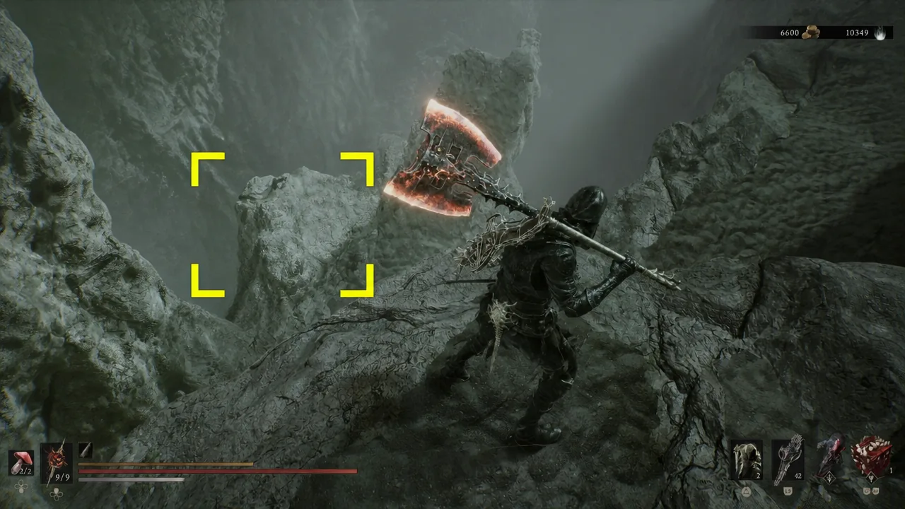 Player holding a glowing greatsword with yellow targeting brackets on screen inside the Withered Shoals