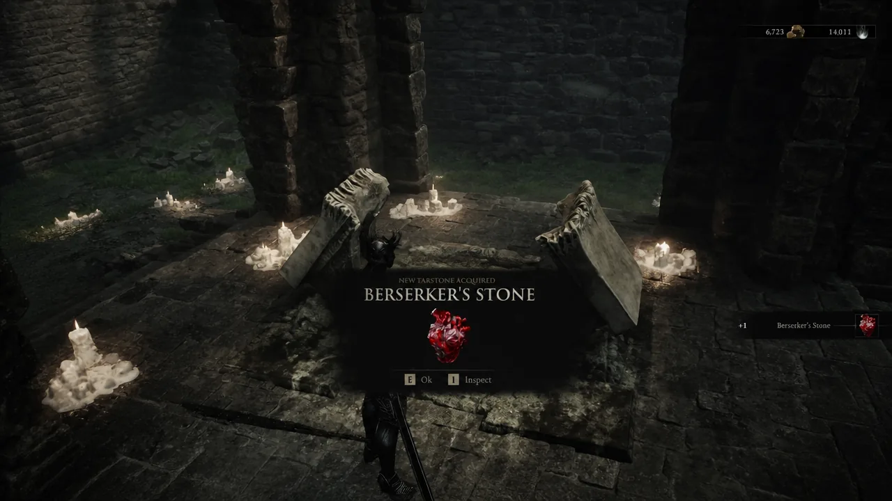 Berserker's Stone pickup prompt showing keys to accept or inspect the item