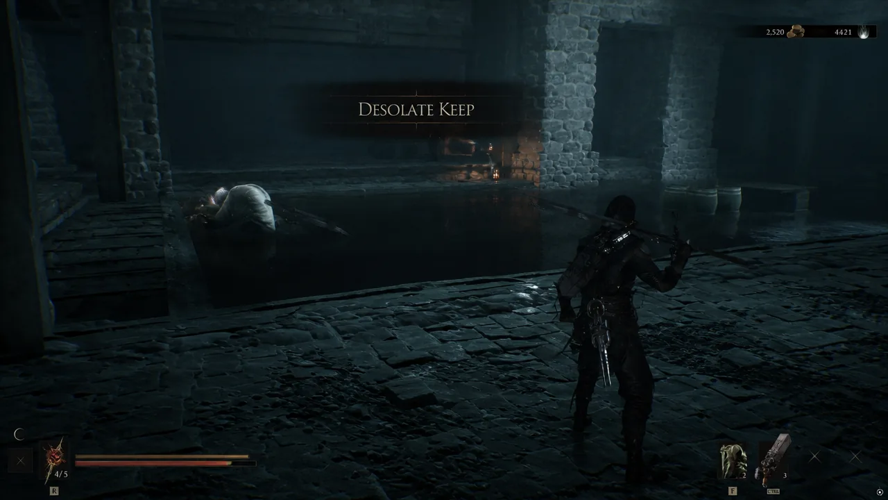 Arrival inside the Desolate Keep with the location name shown over a flooded stone chamber
