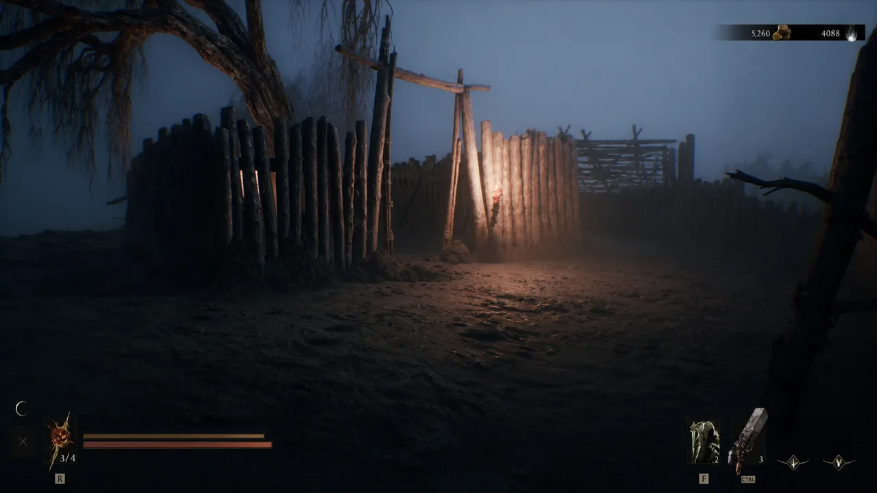 Player approaching a torch-lit wooden palisade gate with the HUD visible in the eerie transformed area