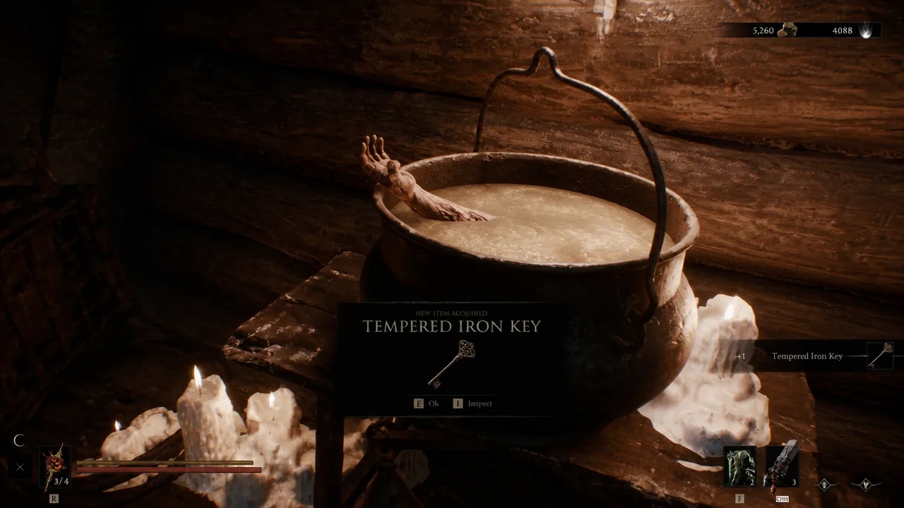 Tempered Iron Key acquisition screen with prompts to confirm or inspect the key