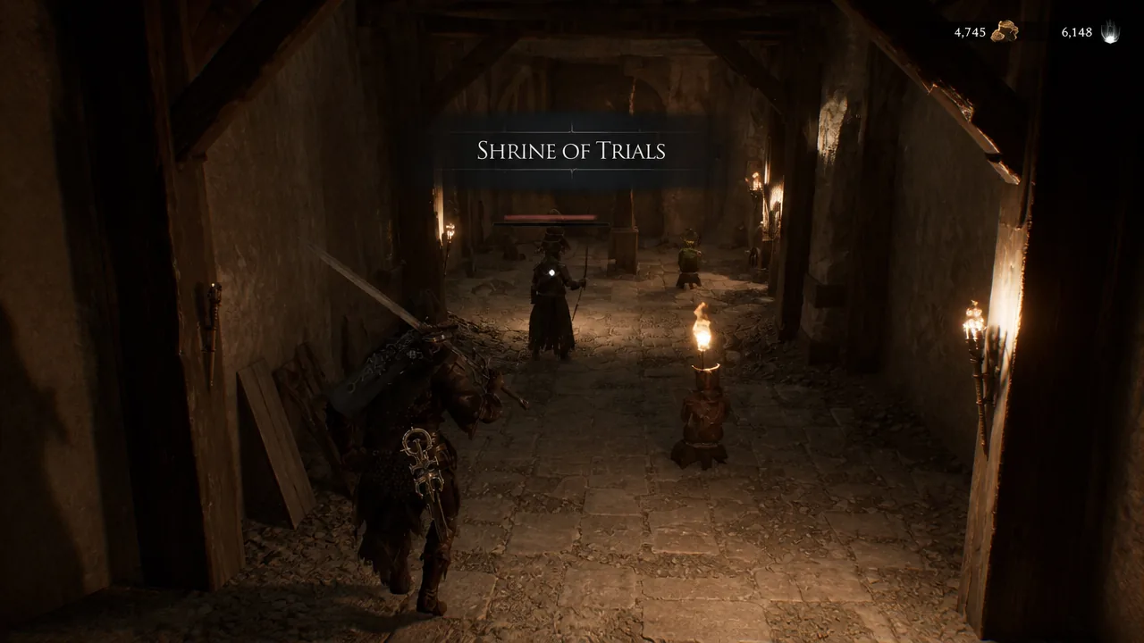 Player enters the torchlit Shrine of Trials as the area title appears and enemies wait ahead