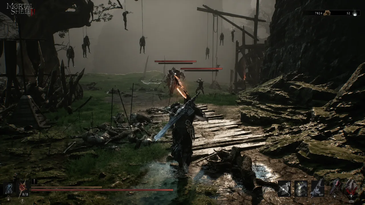 Player swinging a glowing sword at enemies blocking the route to the traverse