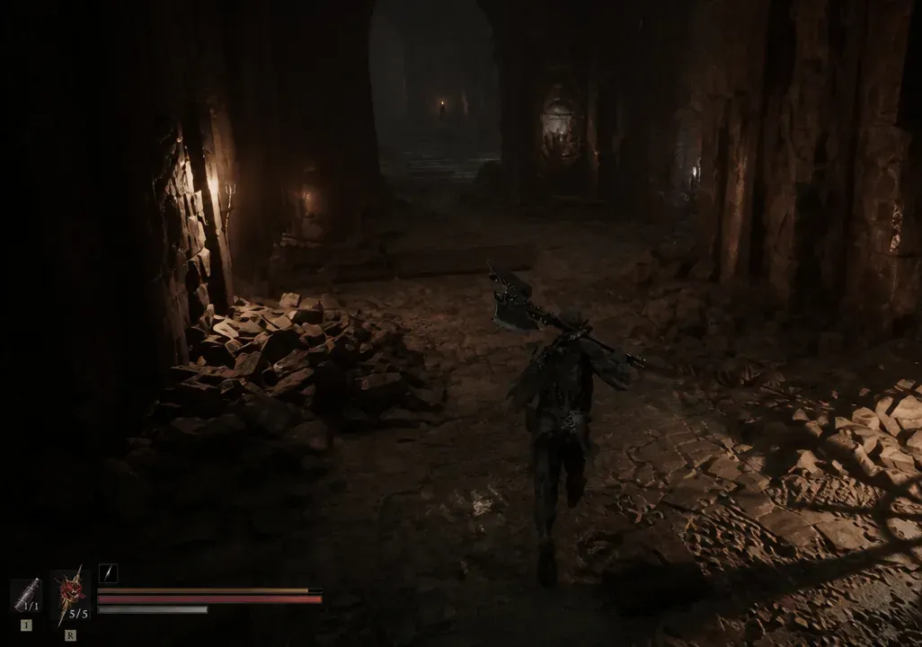 Player character moving through a torchlit underground stone corridor with a weapon drawn