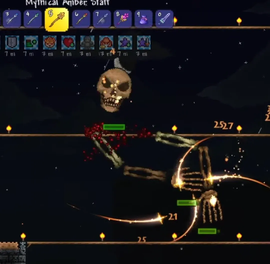 Mythical Amber Staff equipped in slot 5, firing homing projectiles at Skeletron's skull and hands