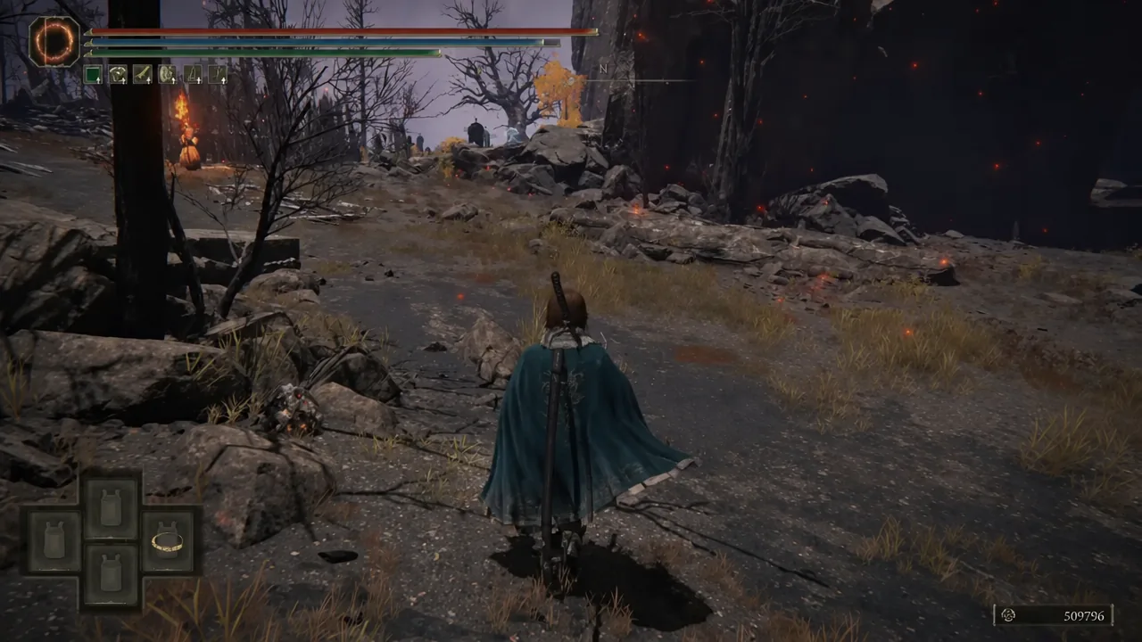 Player riding along a rocky, ember-strewn path with the Elden Ring HUD visible