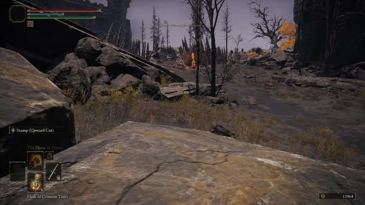 Elden Ring HUD showing Stamp (Upward Cut) equipped as the active weapon skill in a ruined field