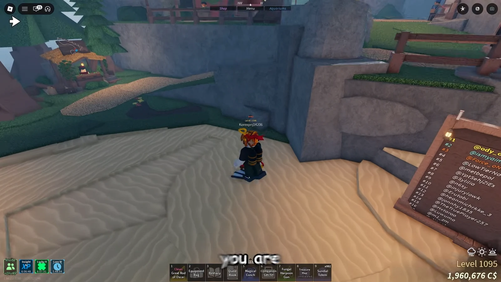 Avatar on a sandy ledge with the Clever Great Rod of Oscar selected in the hotbar