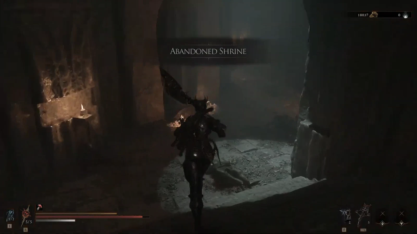 Abandoned Shrine title on screen as an armored character enters a dark interior.