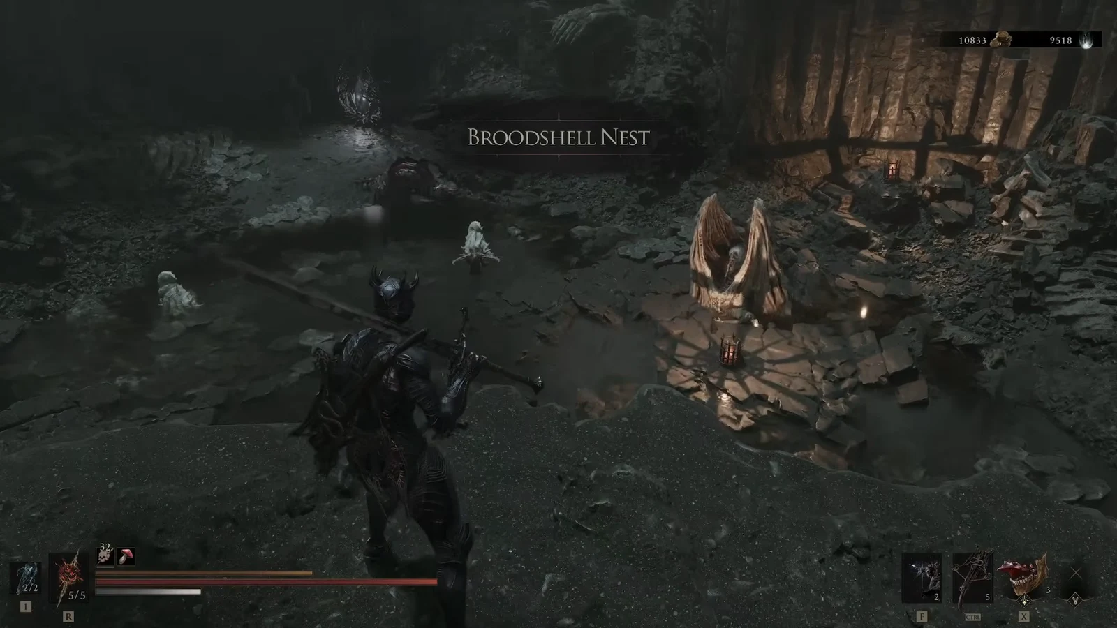 The Harbinger enters the Broodshell Nest cavern near a winged statue with enemies ahead