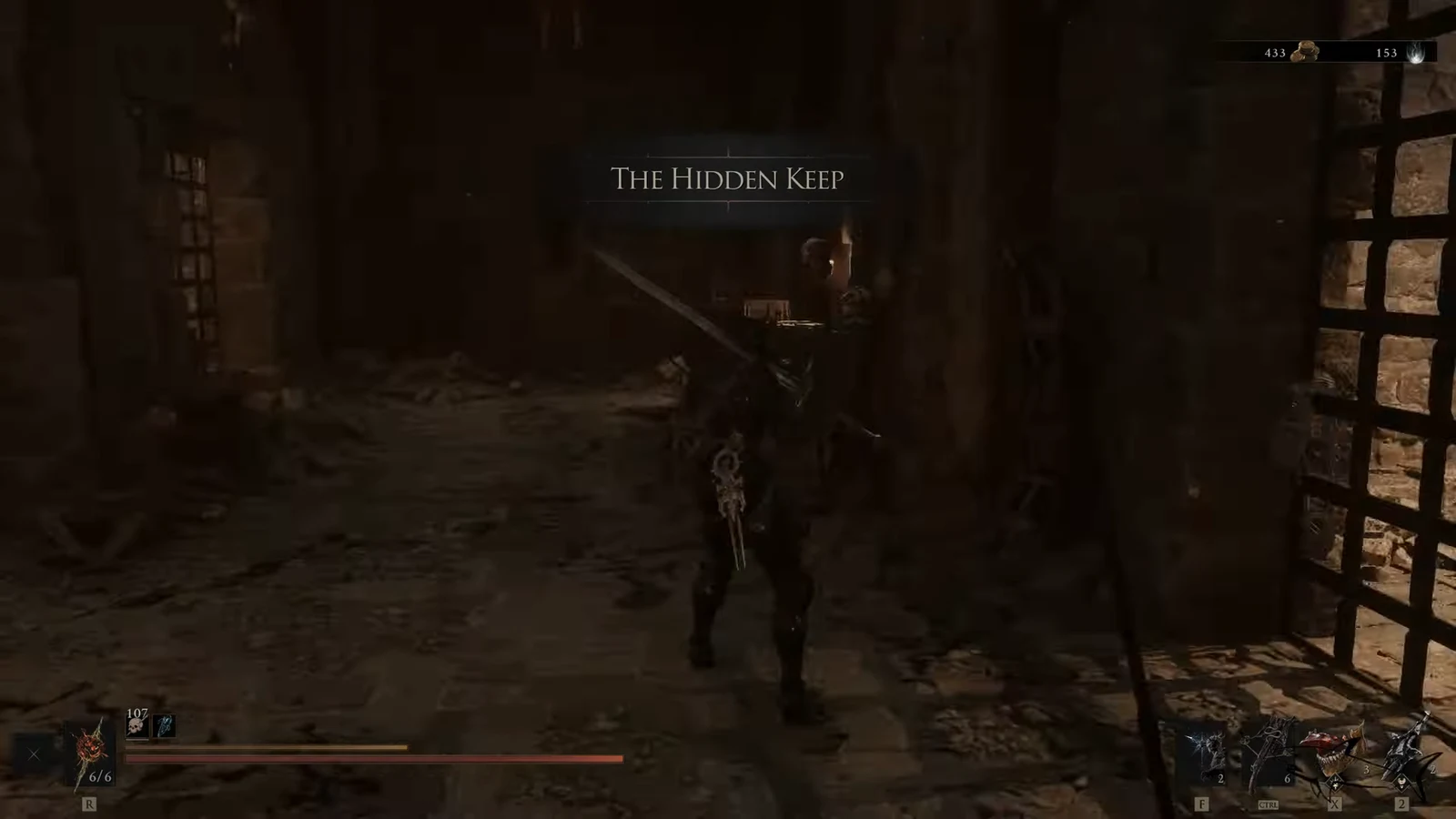 The Hidden Keep area title appears inside a dark ruined stone interior