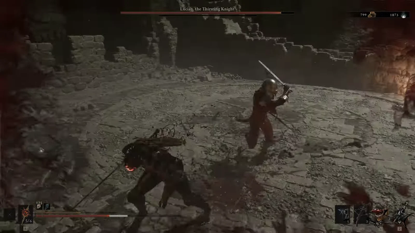 Player character striking Lucian with a sword during the boss fight in the ruined arena