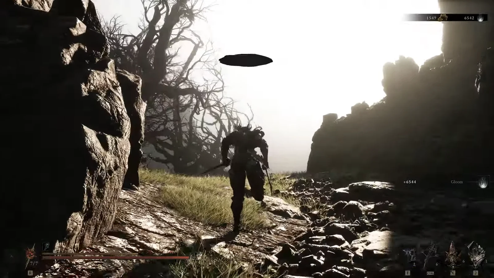 Player character crossing a rocky canyon in Blackridge Cliffs with the combat HUD on screen