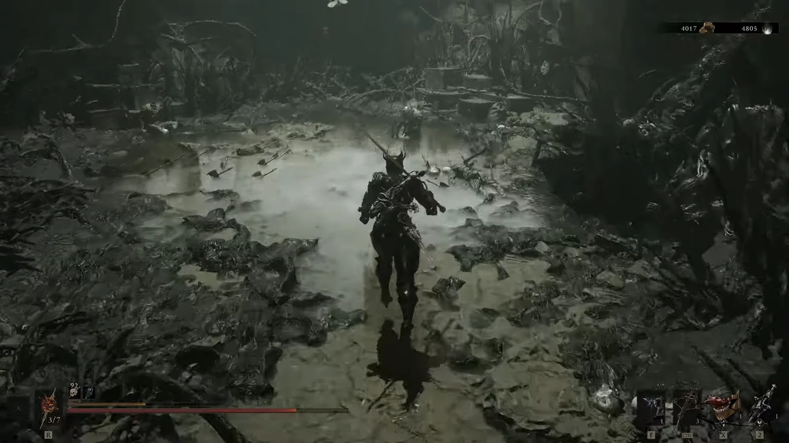 Armored Harbinger running through a murky swamp toward the ruined area, combat HUD visible