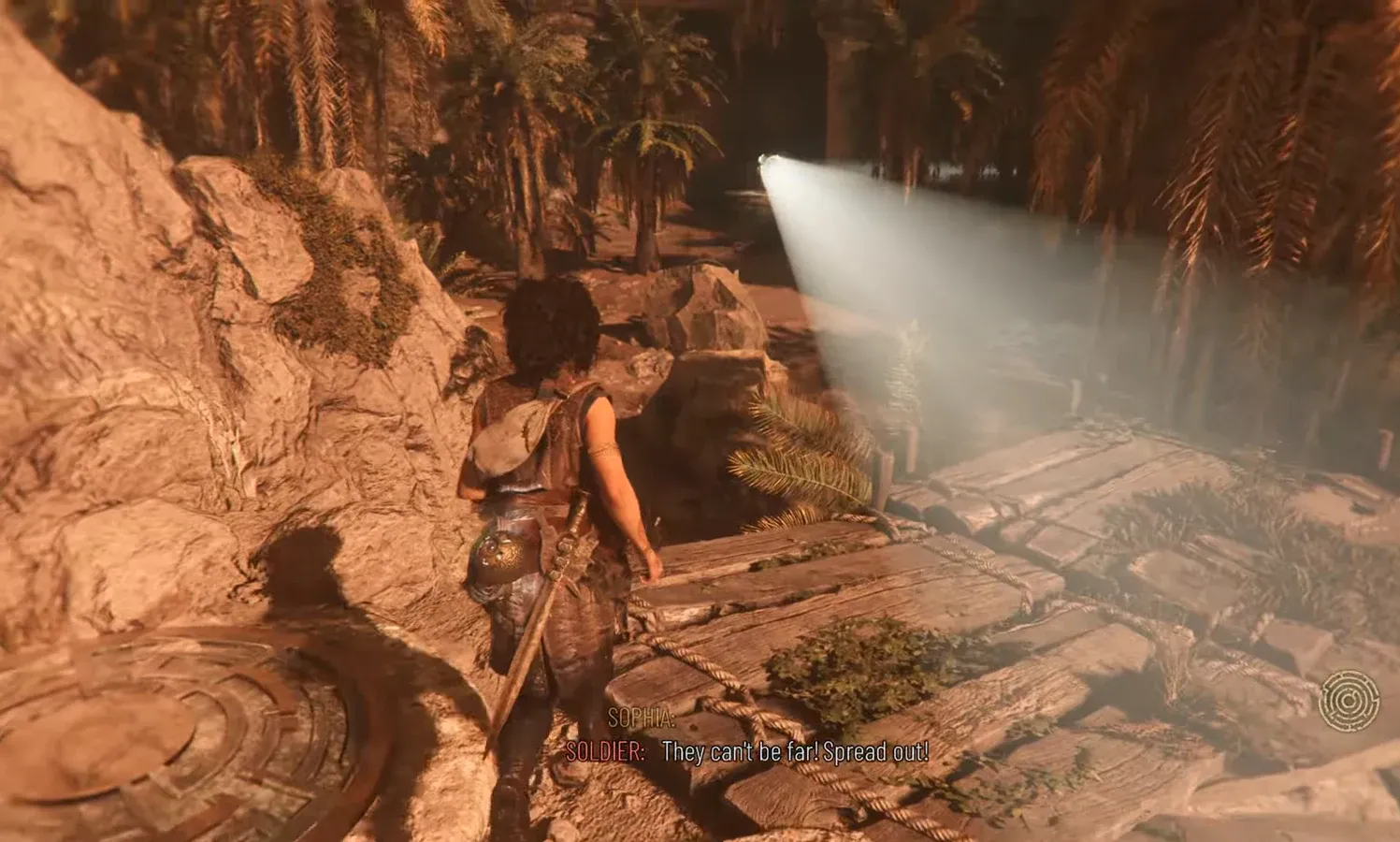 Sophia moves along a wooden walkway as enemy soldiers spread out nearby