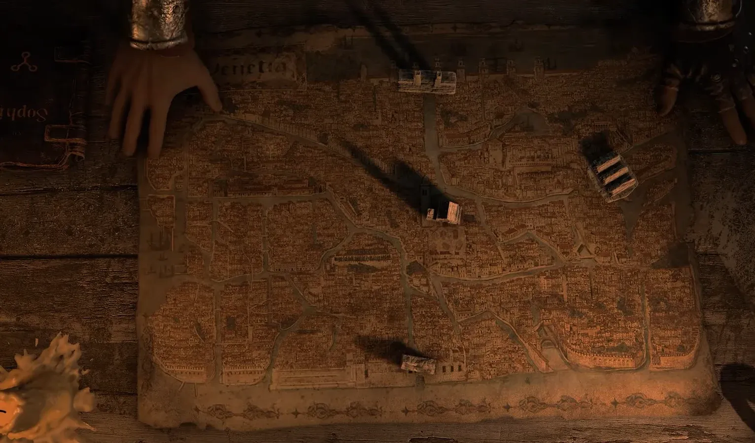 Parchment city map open on screen with several heist locations marked across the districts