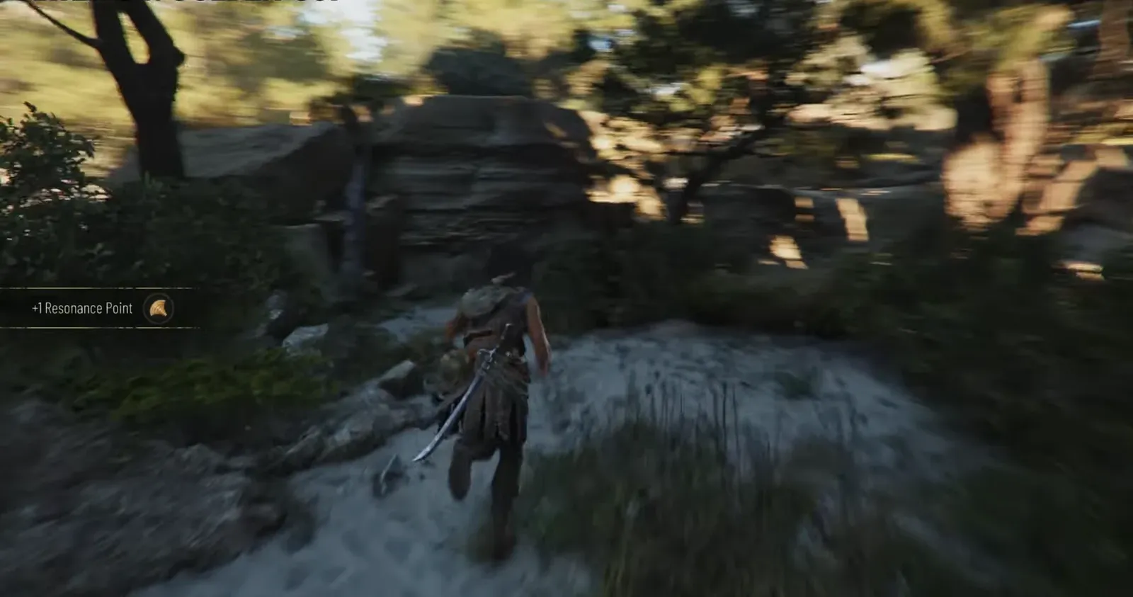 +1 Resonance Point notification while running through forest toward rocky ground near the Golden Cup route