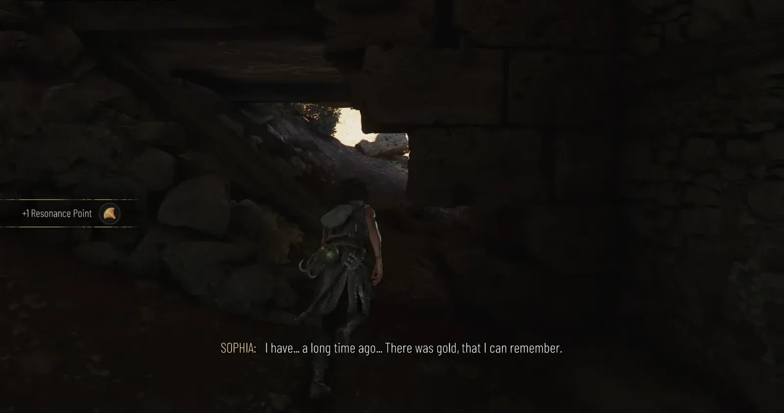 Bead #2 charm collected as Sophia moves through a dark rocky passage