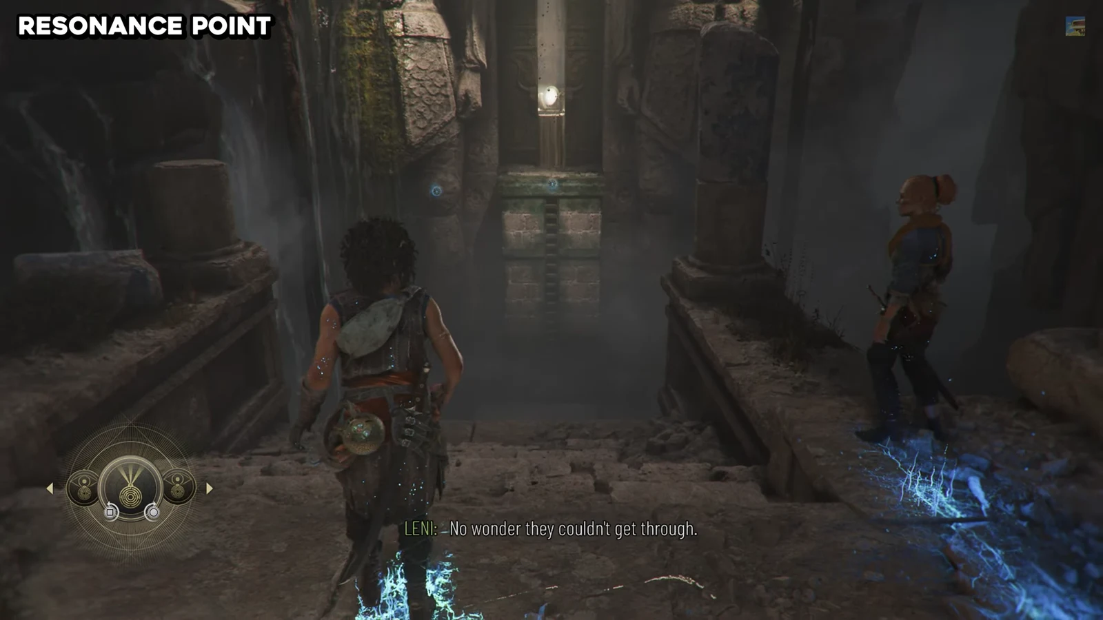 Sophia and Leni crossing a ruined chamber with blue-lit flooring toward glowing wall markers