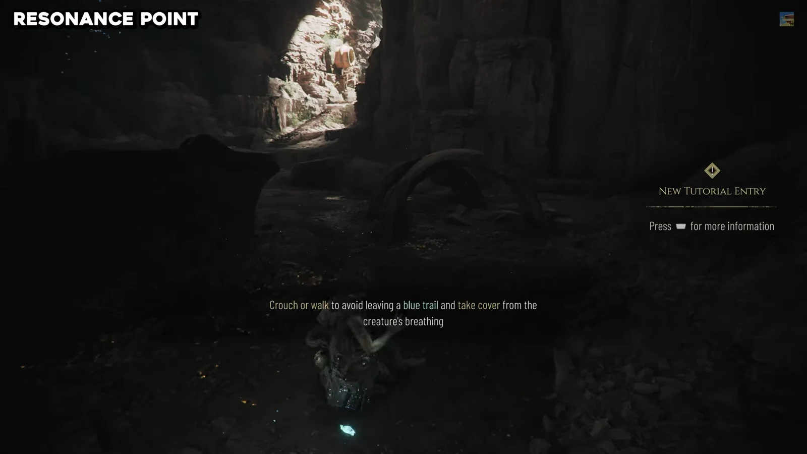 On-screen tutorial prompt explaining how to crouch and avoid leaving a blue trail
