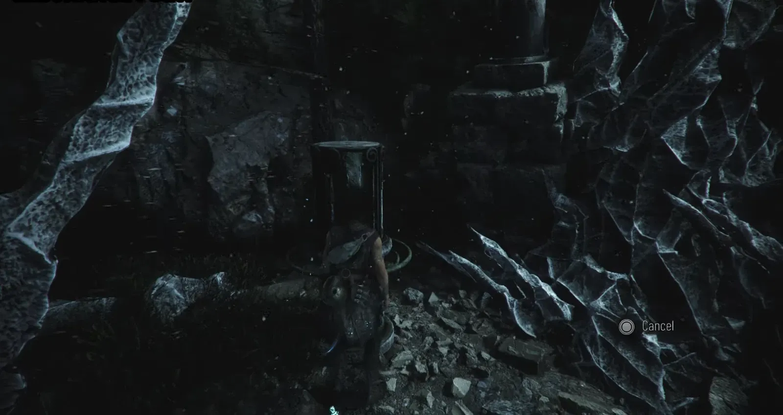 Sophia activating a central stone pedestal with a Cancel prompt showing the interaction is underway