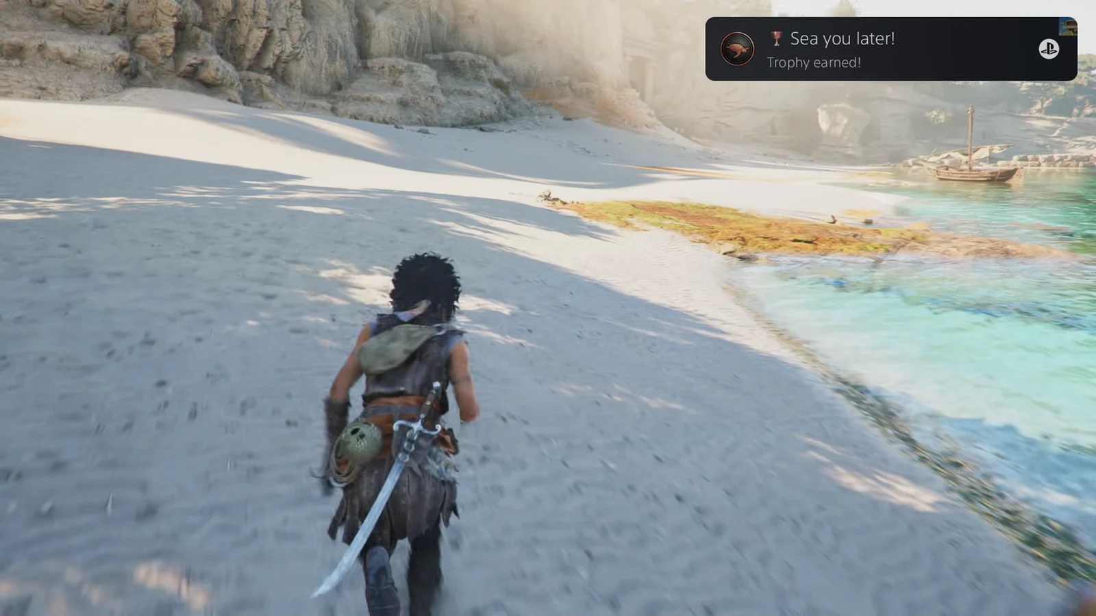 The Sea you later! trophy notification appears on the beach as the turtle enters the water