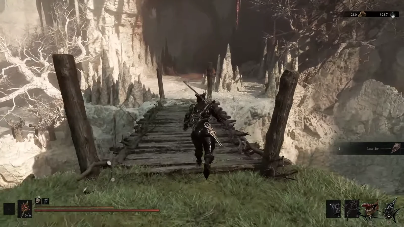 Armored Harbinger crossing a wooden bridge into the Sanguine Caverns with a Laterite pickup showing