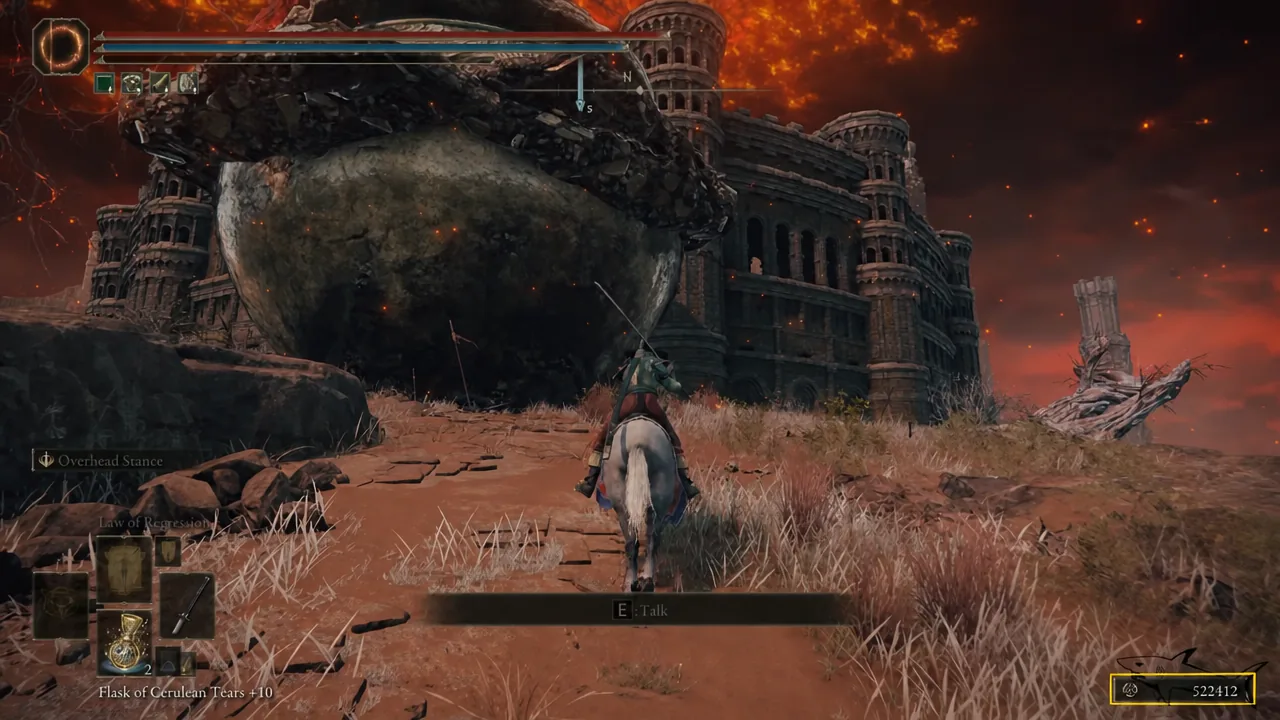 On-screen interaction prompt while standing at the entrance to the Caelid Colosseum
