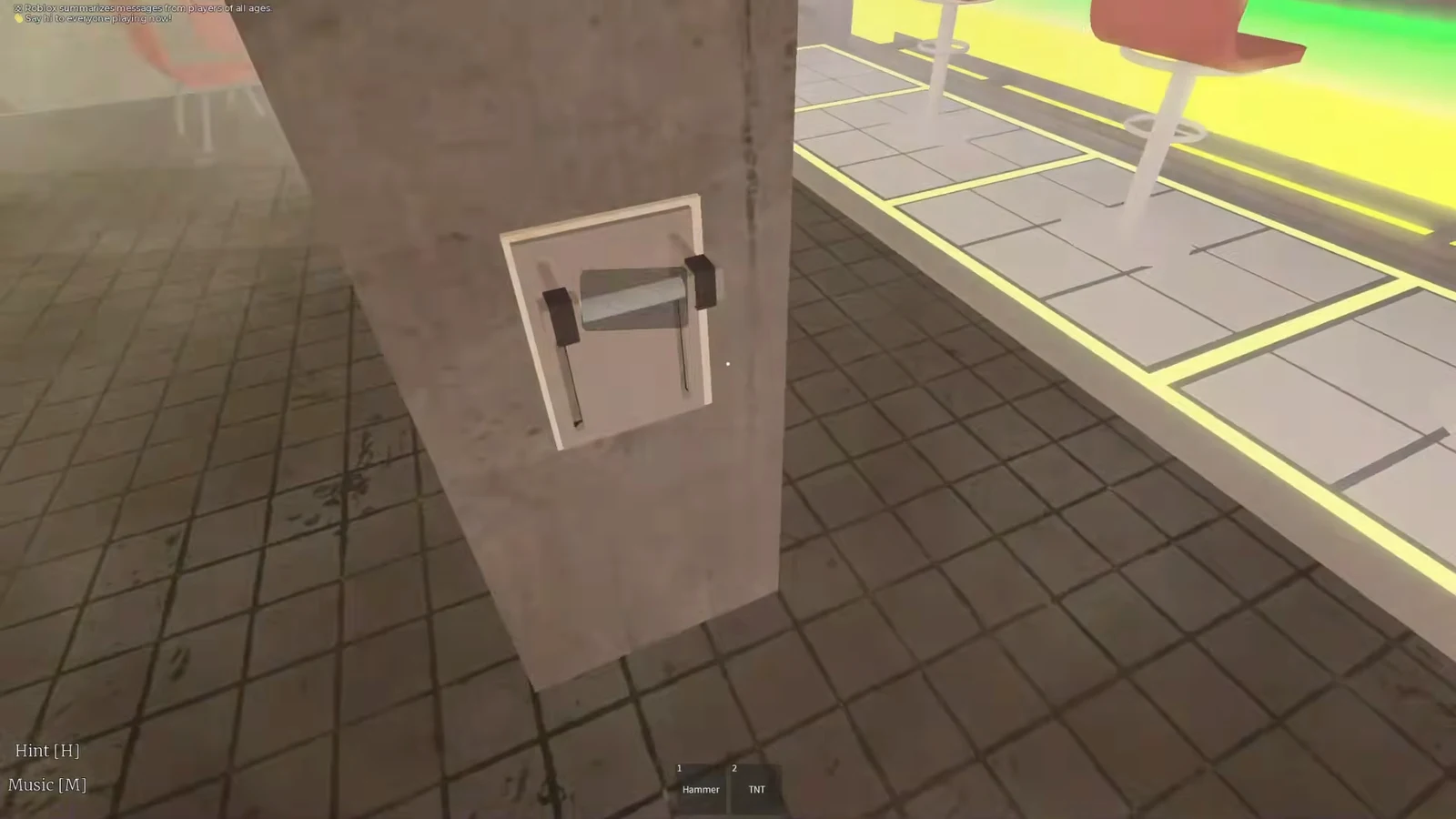 Player interacting with a wall-mounted lever on a concrete pillar, Hammer and TNT in the hotbar