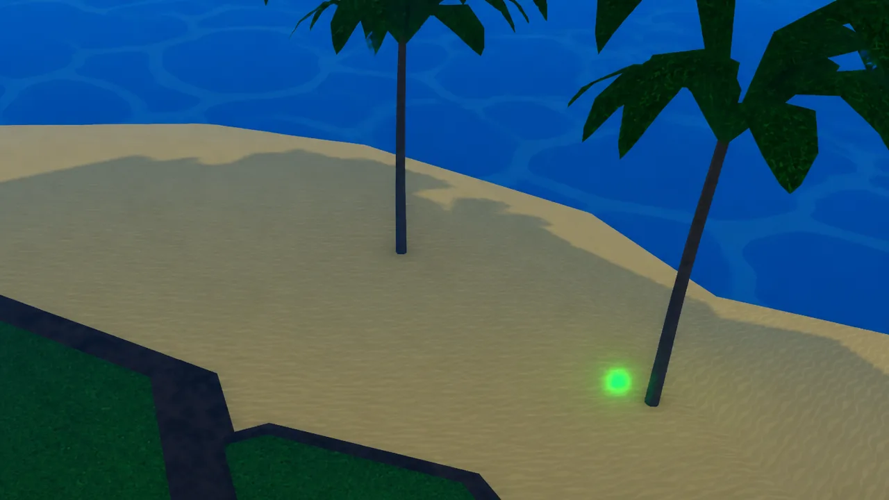 Sandy palm-tree beach beneath the cliffs on Monument Isle where the Reiatsu sits