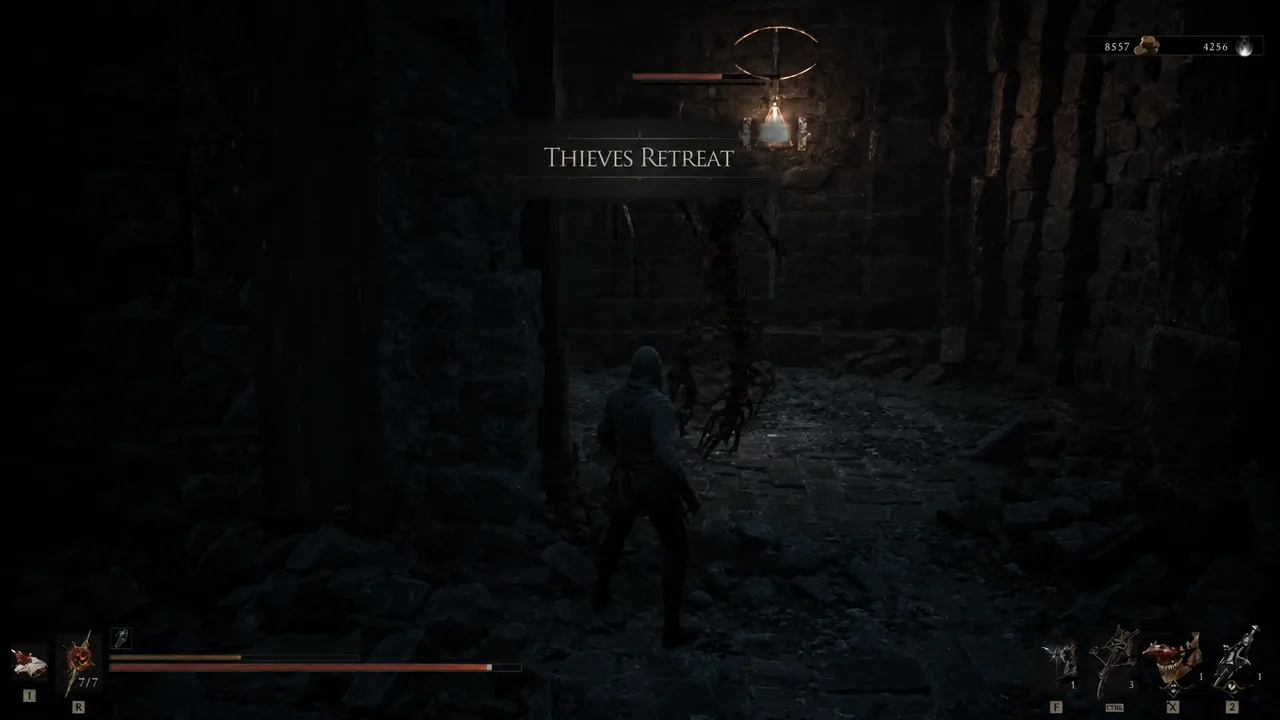 Thieves Retreat location screen appearing as the player enters a dark dungeon corridor