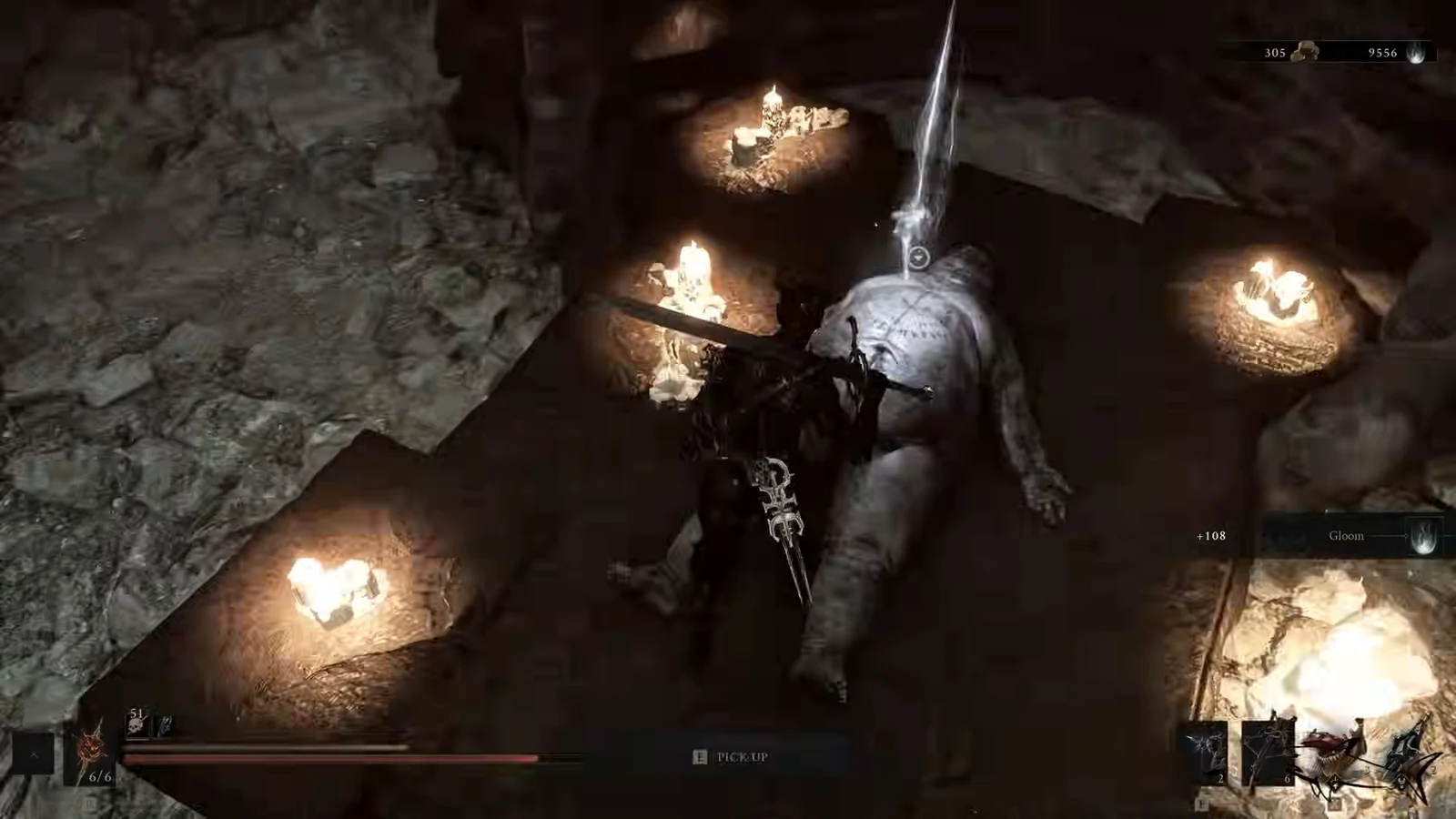 Pick up prompt appearing over a fallen enemy as the player collects a dropped item