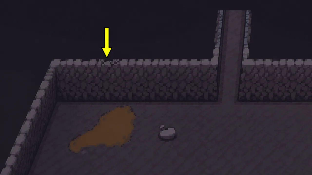 A yellow arrow points to the cracked top edge of a cobblestone wall in Sephiria